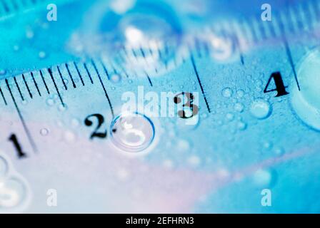 Close-up of a ruler in water Stock Photo