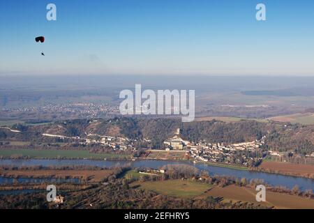 Aerial photography of a paramotor over flying  La Roche-Guyon en Vexin and its castle, in Val-d'Oise department (95780), region Ile-de-France, France Stock Photo