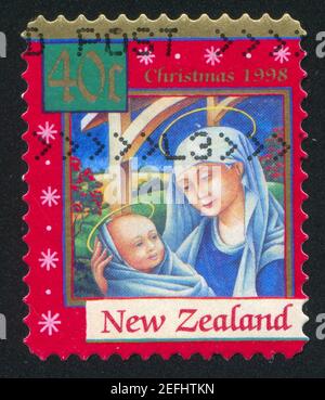 NEW ZEALAND - CIRCA 1998: stamp printed by New Zealand, shows Madonna with Child, circa 1998 Stock Photo