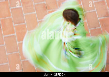 High angle view of a woman dancing Stock Photo