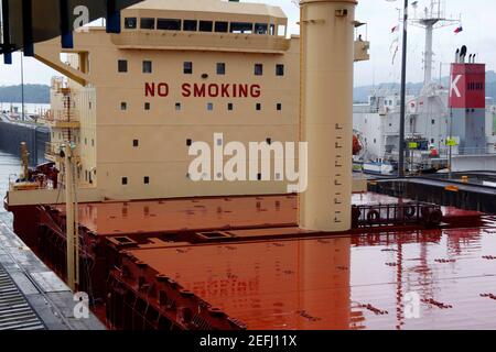 No Smoking warning on bridge of large oil tanker in Gatun Locks , Panama Canal, Panama Stock Photo