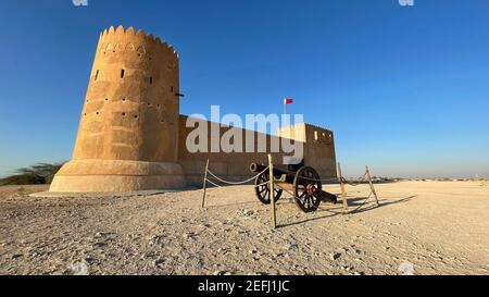 Rebuilt historic Fort Zubarah (Al Zubara) in North East of the deserts of Qatar on the edge of the Persian gulf on a sunny summer day