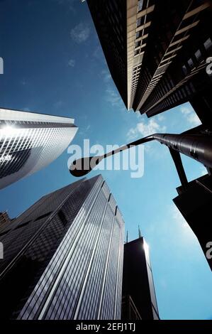 Low angle view of skyscrapers in a city, Chicago, Illinois, USA Stock Photo