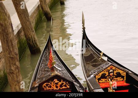 High angle view of two gondolas in a canal, Venice, Veneto, Italy Stock Photo