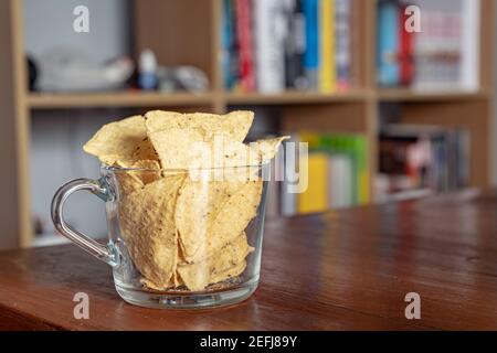 Tortilla chips in a glass mug Stock Photo