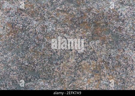 Texture pattern of a red granite stone rock with weathered aged grunge structure Stock Photo
