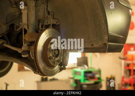 Detail of a worn disc brake ready for replacement and maintenance Stock Photo