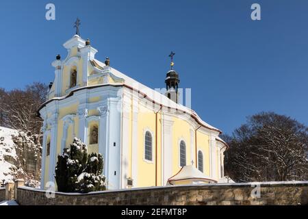 Church of St. Peter and Paul Horni Prysk in sunny winter day. Czech Republic Stock Photo