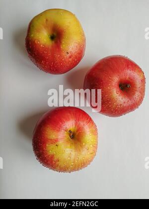 Red apples on white background. View from above Stock Photo