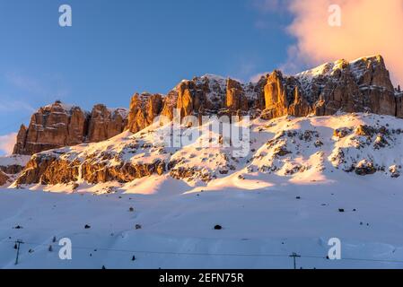 Majestic Snowy Rocky Peak Warmly Lit By A Setting Sun In The Dolomites In Winter Stock Photo Alamy