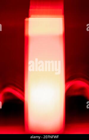 Red white and gradient colors mixed with the lighting effect on home decor Stock Photo