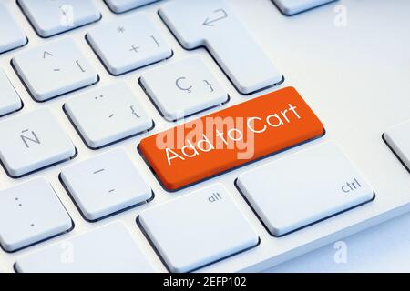 Add to cart orange on computer Keyboard Key Stock Photo
