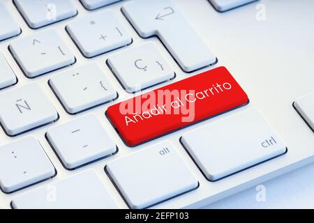 Add to cart on spanish language Word on computer Keyboard Key Stock Photo