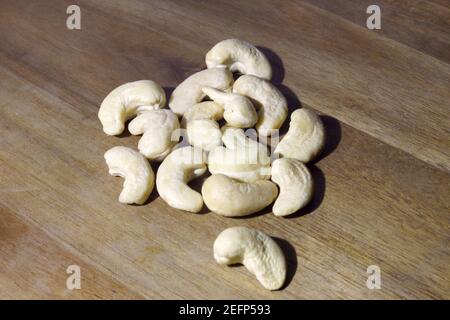 cashew nuts on wooden table. Healthy snack Stock Photo