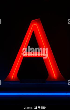 Shining red neon letter A Stock Photo