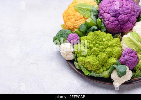 Purple, yellow, white and green color cauliflowers Stock Photo