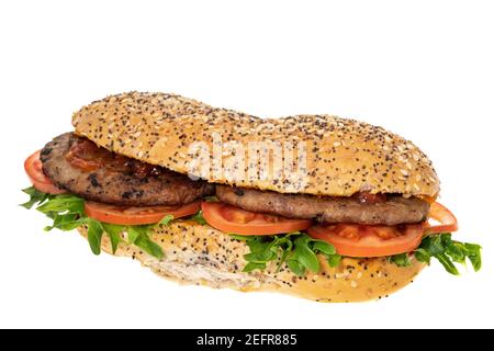 Two beef burgers and salad in a bread bun - white background Stock Photo