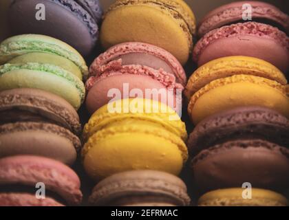 Close up of assorted fresh french macarons in a take away box Stock Photo
