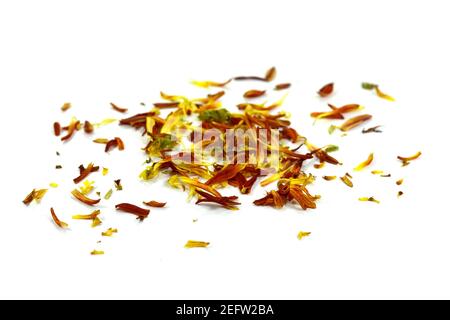 Multicolored petals scattered on a white background Stock Photo