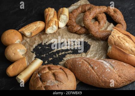 Different types of pastries on a parchment paper Stock Photo