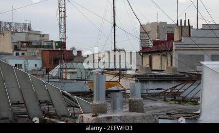 Eclectic rooftops with metal chimneys in Bucharest, Romania, close view Stock Photo