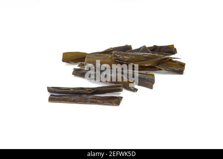 Dried kombu seaweed Japanese dry kelp isolated on white background Stock Photo