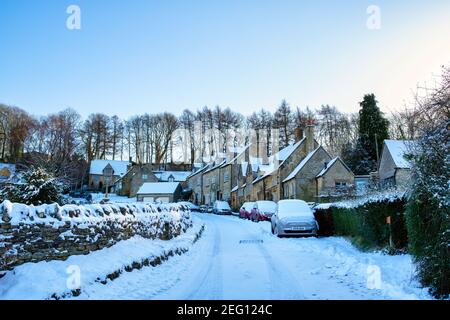 Cotswold stone cottages in the snow in January. Snowshill, Cotswolds, Gloucestershire, England Stock Photo
