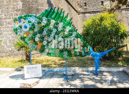 Kator Котор Kotor is a coastal town in Montenegro. Gulf of Kotor.  The Trapped Fish , recycled plastic bottle sculpture of a fish By Zarobljena Riba. Stock Photo