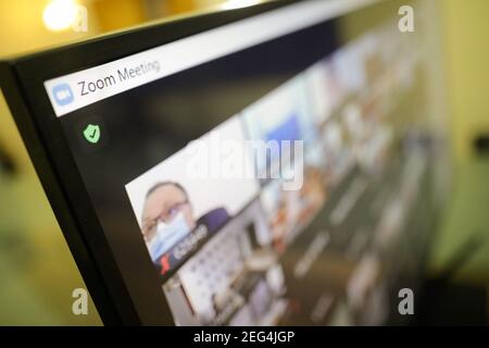 Bucharest, Romania - February 4, 2021: Shallow depth of field image (selective focus) with the Zoom video conference app/site - work from home during Stock Photo