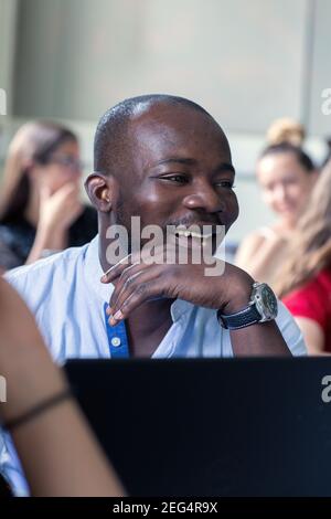 Smiling African male college student Stock Photo