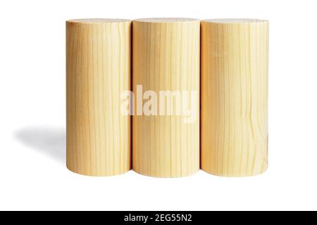 Three Wooden Cylindrical Blocks in a Row on Whie Background Stock Photo