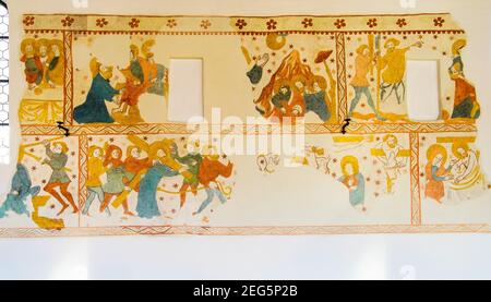 Gothic wall frescoes scenes from the life of Jesus Christ, including the scene of the Passion in the Church of Saint-Pierre and Saint-Paul, Vermes, Ca Stock Photo