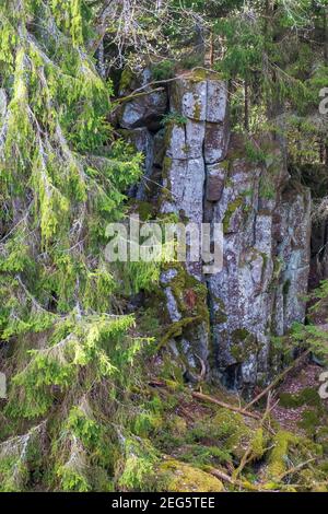 Fallen stone and rock formation with a mountain background at Gamti ...