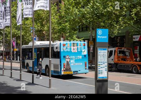 Sydney bus leaving Wynyard bus stop on York street in Sydney city centre,NSW,Australia Stock Photo