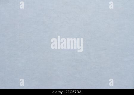Light blue linen pastel fabric, background or texture, closeup, top view, horizontal Stock Photo
