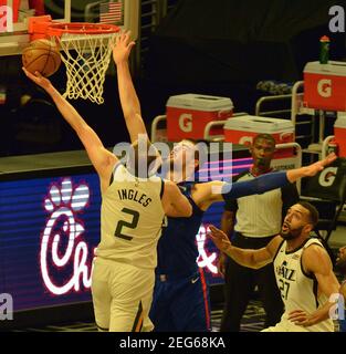 Los Angeles, United States. 18th Feb, 2021. Utah Jazz forward Joe Ingles shoots over Los Angeles Clippers' center Ivica Zubac during the first half at Staples Center in Los Angeles on Wednesday, February 17, 2021. The Jazz defeated the Clippers 114-96. Photo by Jim Ruymen/UPI Credit: UPI/Alamy Live News Stock Photo