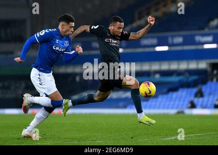 Liverpool, United Kingdom, 17th February 2021. Pictured left to right, Everton’s Ben Godfrey and Manchester City's Gabriel Jesus in action. Credit: Anthony Devlin/Alamy Live News Stock Photo