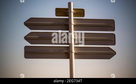 Back view of french road signs and blue sky, France Stock Photo