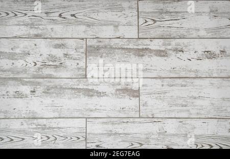 White texture of weathered wooden planks floor. Closeup Stock Photo