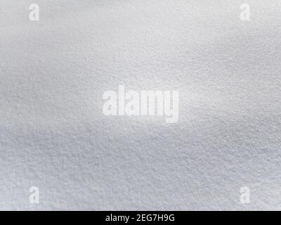 Background texture of white fresh snow sparkling in the sun, copy space, mobile photo Stock Photo