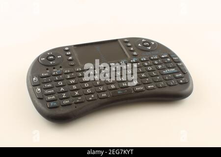 Wireless mouse keyboard with multifunctional touchpad for laptop or tablet , kidney shaped keyboard Stock Photo
