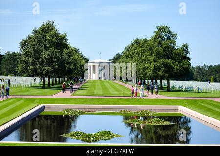 NORMANDY, FRANCE - July 5, 2017: Tourists visiting 'The Garden of the Missing' at the American Cemetery from the Battle of the Normandy Landings durin Stock Photo