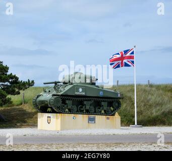 NORMANDY, FRANCE - July 4, 2017: Army commemorative vehicles, along the so-called Utah Beach, at the Normandy landings, during World War II. Stock Photo