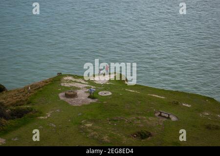 A young couple looking out over the English Channel Stock Photo