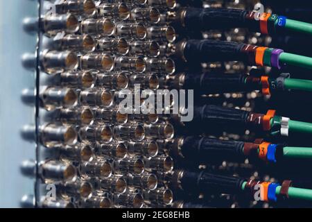 Connecting BNC connector for CCTV system. Broadcasting system room. Stock Photo