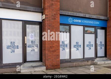 Cork, Ireland. 18th Feb, 2021. People in Cork city centre go about their business during the government's level 5 lockdown. This Covid Screening Centre was open and testing people. Credit: AG News/Alamy Live News Stock Photo