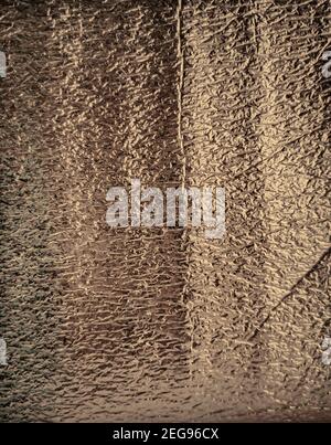 Abstract background: metal surface with shiny gold pattern Stock Photo