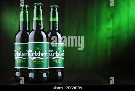 POZNAN, POL - OCT 2, 2020: Bottles of Carlsberg pale lager beer produced by Carlsberg Group, a Danish brewing company founded in 1847 with headquarter Stock Photo