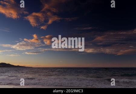 Beautiful sunset over Las Canteras beach in Las Palmas de Gran Canaria Stock Photo