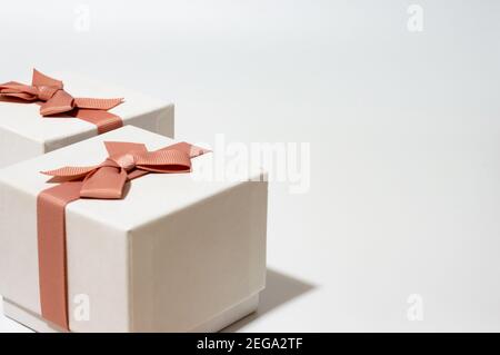 two white gift boxes on empty white background Stock Photo